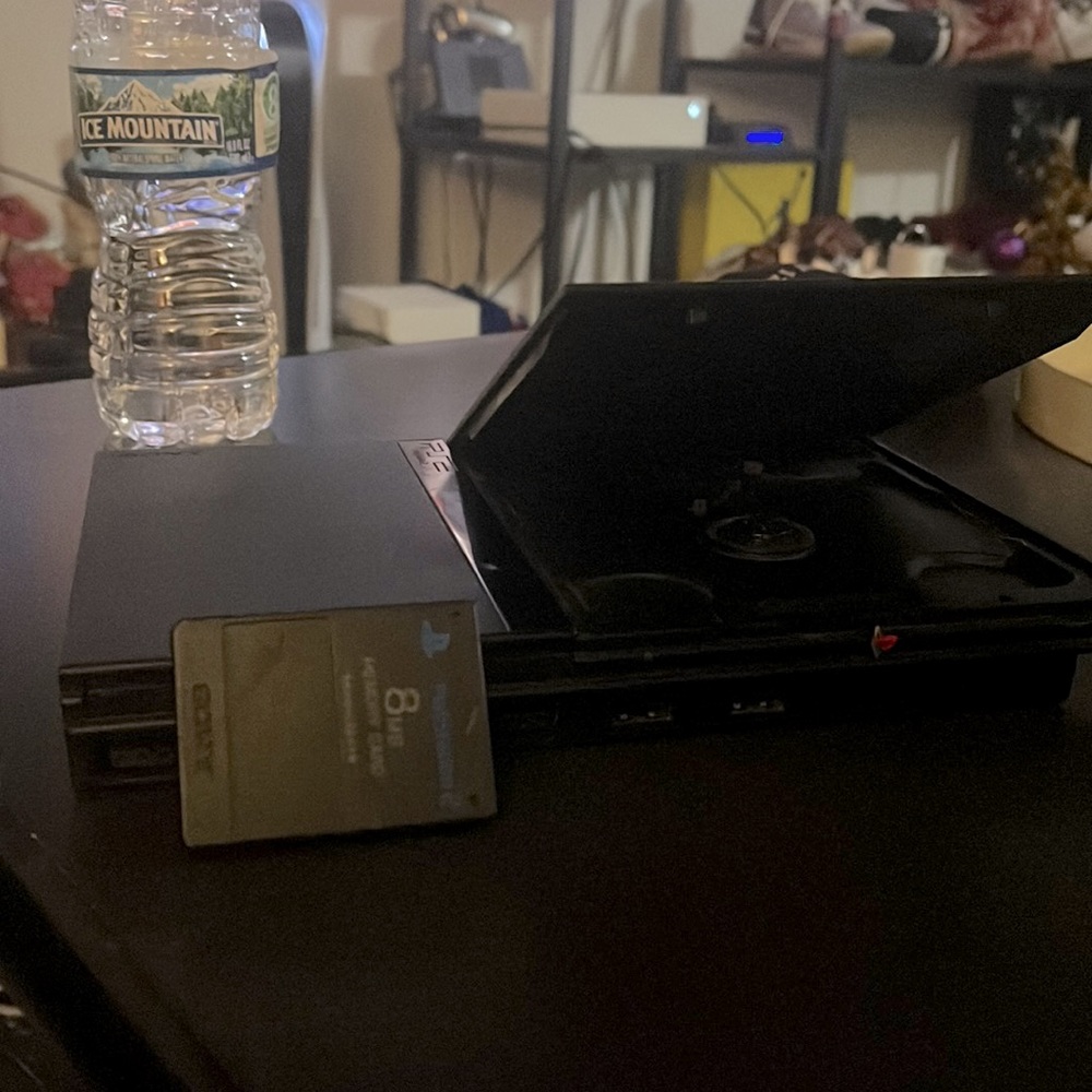 Ps2 slim and memory card.
